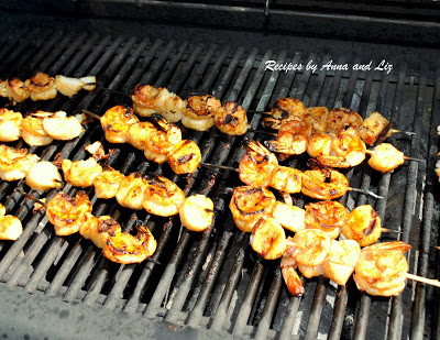 Best Grilled Shrimp and Scallop Kabobs grilling on a BBQ by 2sistersrecipes.com 