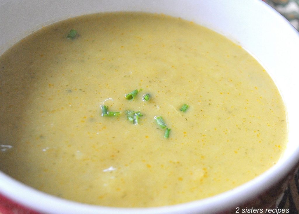 A close-up photo of soup in a bowl. by 2sistersrecipes.com 