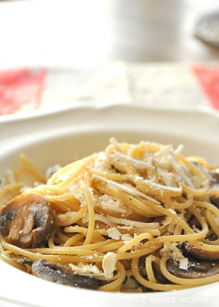Spaghetti with Wild Mushrooms, Cognac and Truffle Oil by 2sistersrecipes.com 
