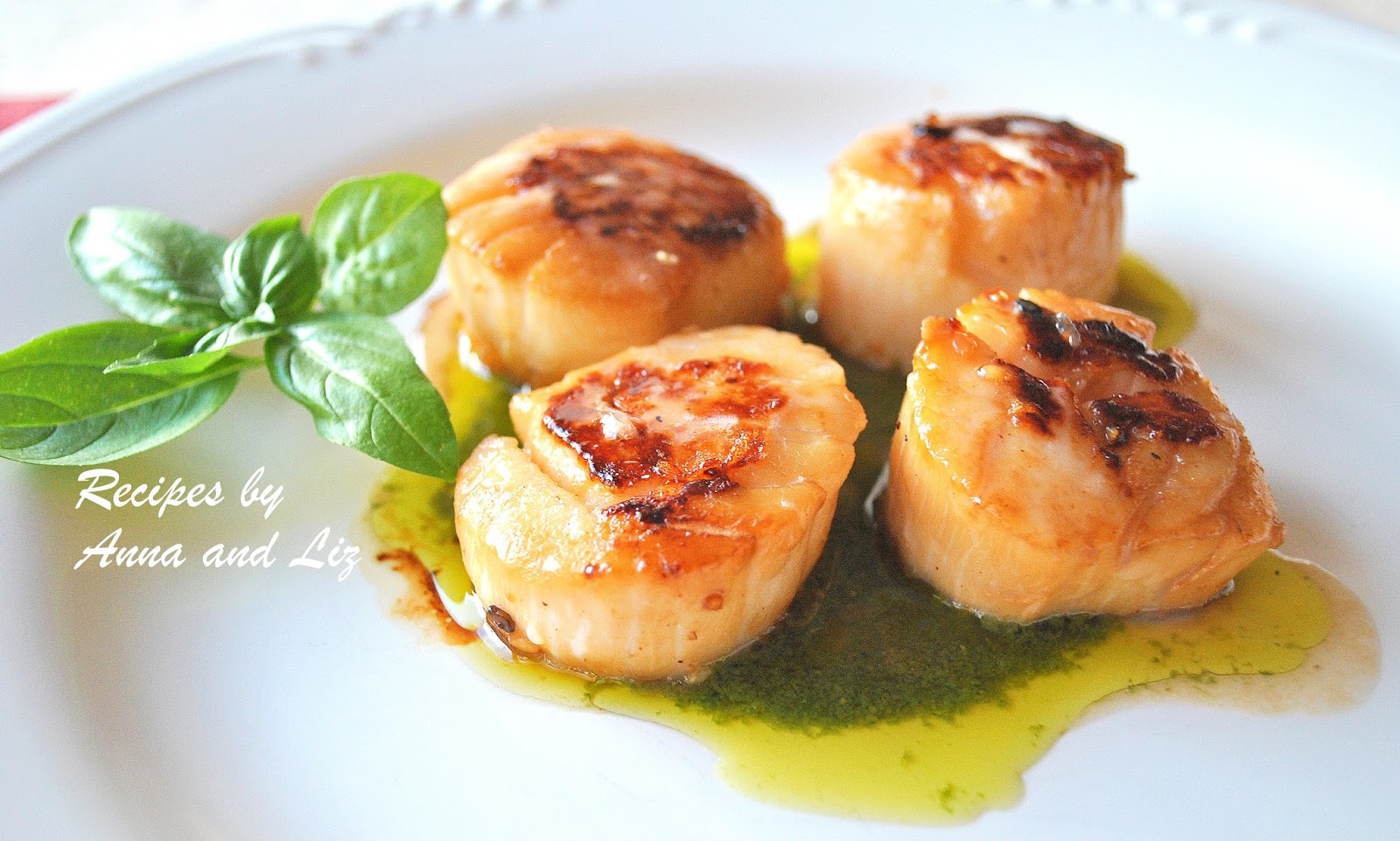 Seared Sea Scallops Over Pesto Sauce by 2sistersrecipes.com