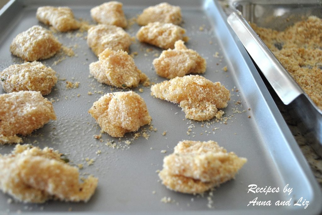 chicken nuggets on baking sheet by 2sistersrecipes.com 