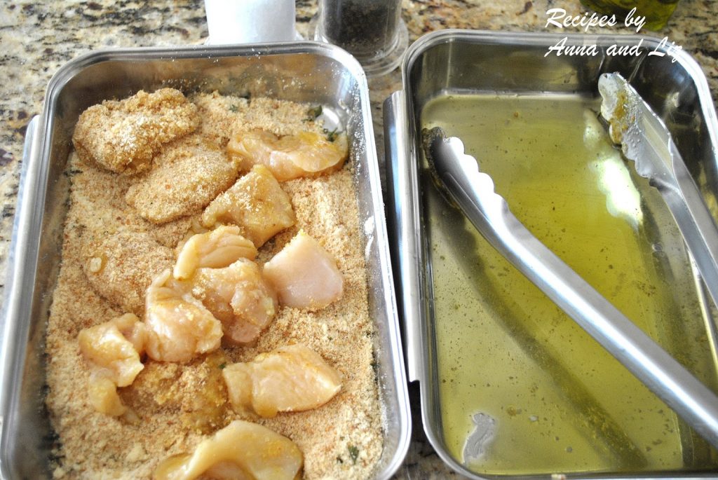 Small pieces of chicken dipped in oil then into bread crumbs by 2sistersrecipes.com 