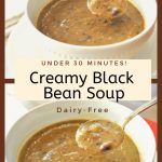 A white bowl filled with a creamy black beam soup.