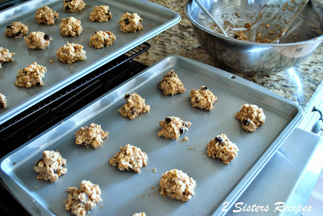 Cookie dough set on a baking sheet to bake. by 2sistersrecipes.com 