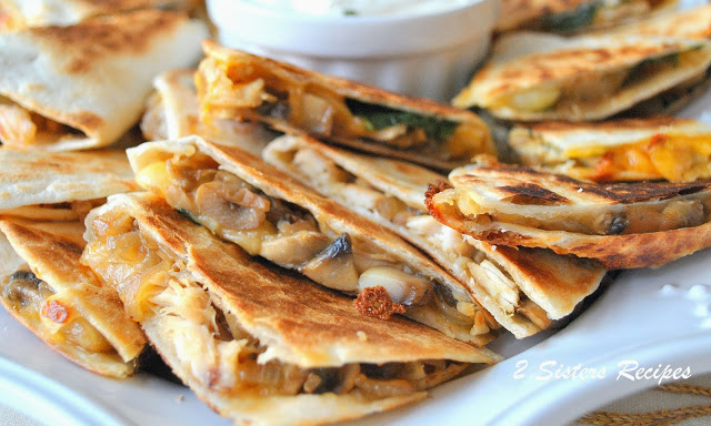 A close up photo of chicken quesadillas. by 2sistersrecipes.com
