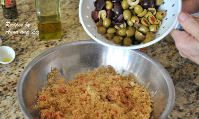 Mixing the bread crumbs mixture in a solver bowl, with the olive mixture. by 2sistersrecipes.com 