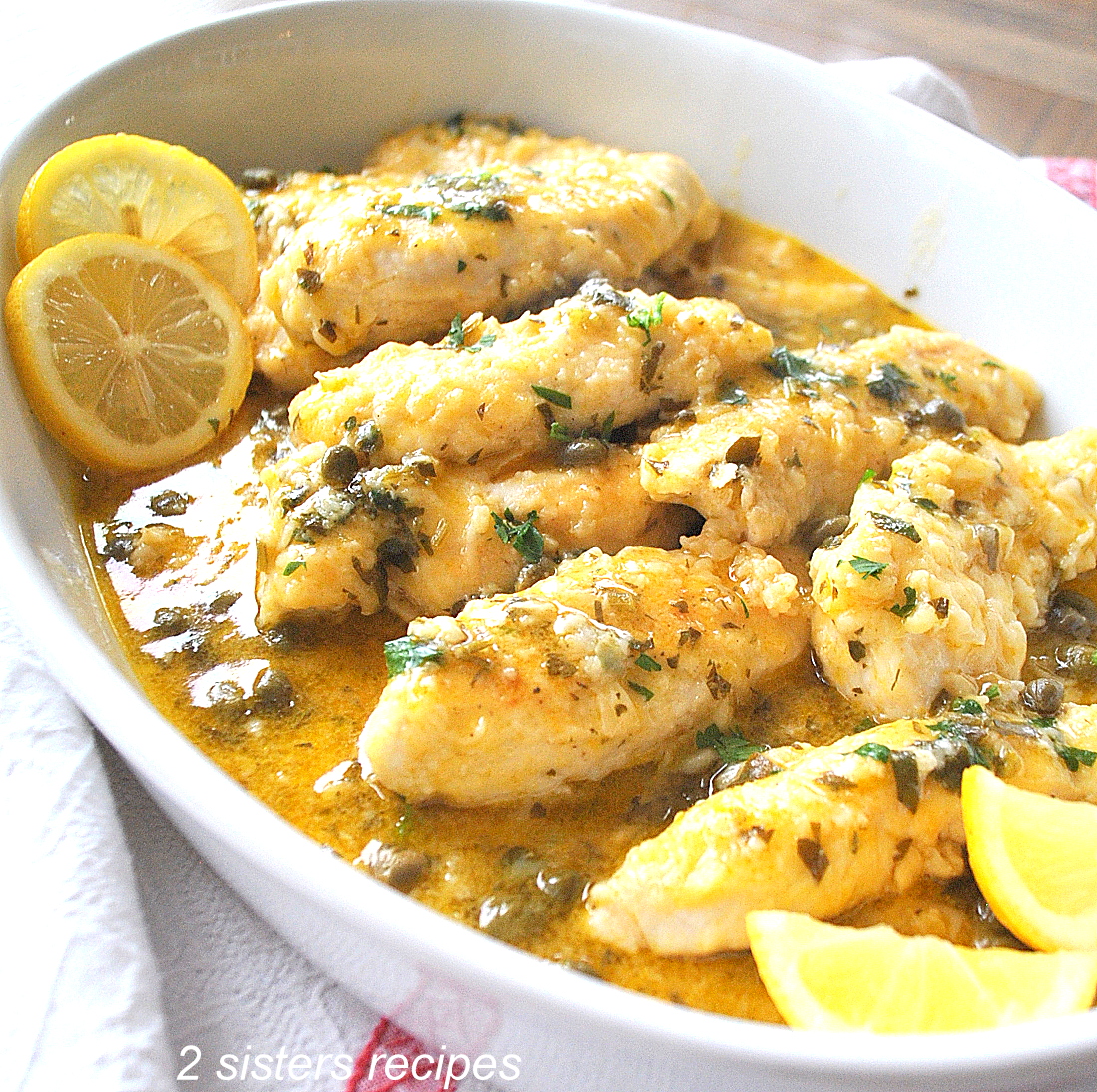Chicken Tenders Smothered in Lemon and Parsley by 2sistersrecipes.com
