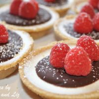 Mini Panna Cotta Tarts with Lingonberries and Chocolate. by 2sistersrecipes.com
