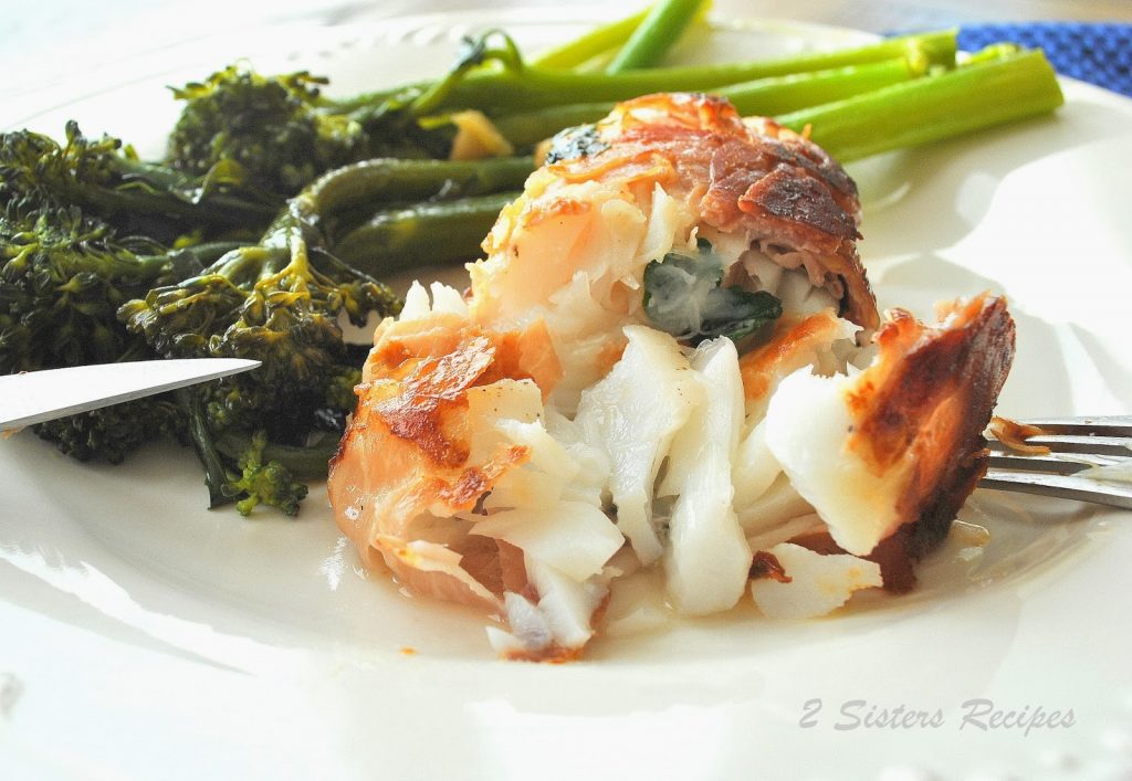 A dish with cod wrapped in  prosciutto and cooked until it is crispy. by 2sistersrecipes.com 