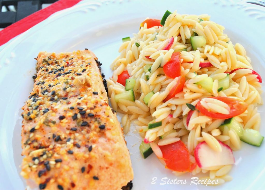 grilled salmon served with an orzo salad. by 2sistersrecipes.com 