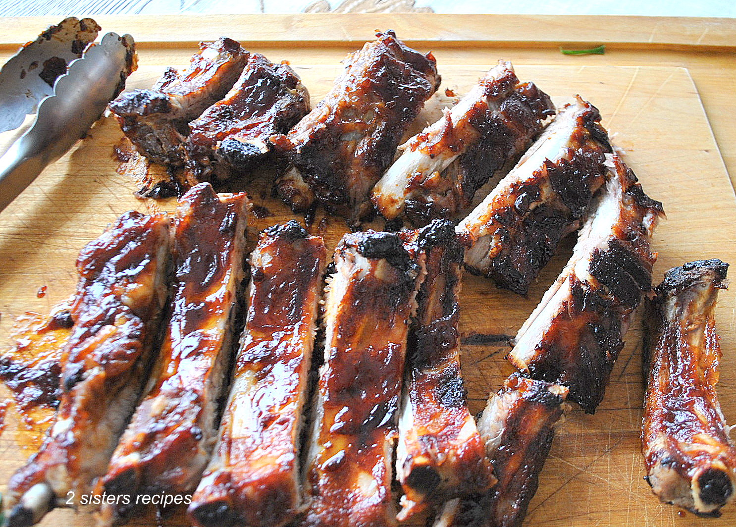 contrast goud ontsnappen Fast & Easy Oven Roasted Baby Back Ribs - 2 Sisters Recipes by Anna and Liz