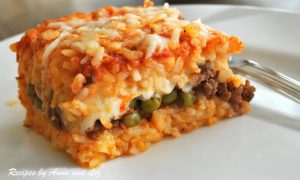 Best Rice Ball Casserole Stuffed with Meat and Peas