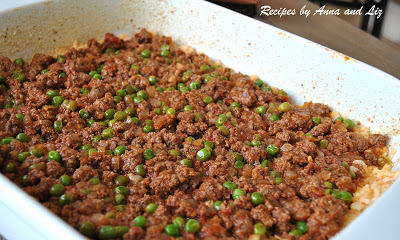 Photo showing baking dish the the Meat and Peas mixture by 2sistersrecipes.com 