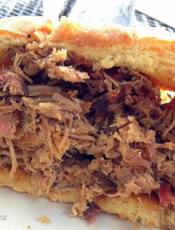 Easy Oven-Braised Pulled Pork Sandwiches by 2sistersrecipes.com
