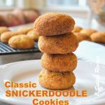Classic Snickerdoodle Cookies piled on a white plate.