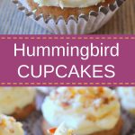 A cupcake topped with white frosting and crushed pecans on top.