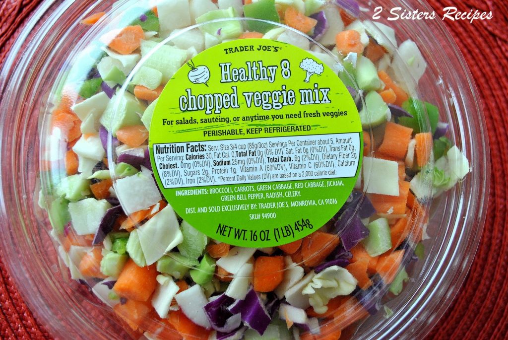 Photo of the pre-chopped vegetables in a plastic container. by 2sistersrecipes.com 
