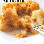 A serving of some roasted cauliflower gratin with a fork