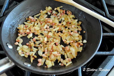 a Large skillet browning chopped onions and pancetta. by 2sistersrecipes.com