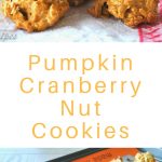 Three pumpkin cookies and a sheet pan filled with baked cookies.