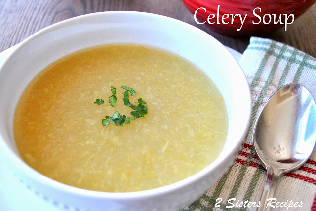 A white bowl of celery soup on the table. by 2sistersrecipes.com