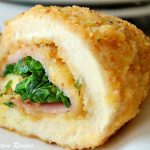 A chicken cutlet stuffed and rolled up into a rollatini, coated with bread crumbs and baked.