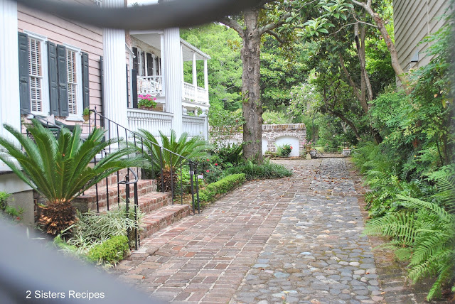 A side view of a home and garden in Charleston, SC