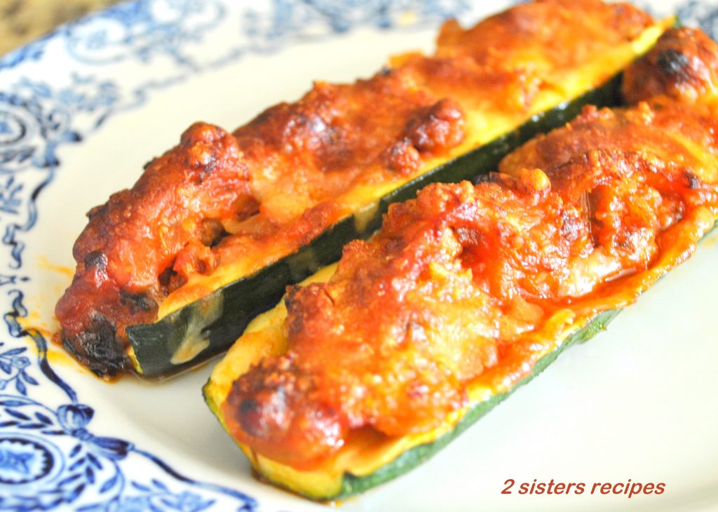 Zucchini Stuffed with Sausage Ragu and Cheese by 2sistersrecipes.com 