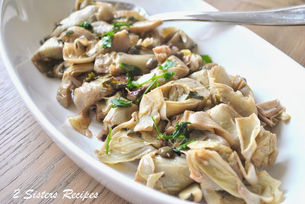 Artichoke Hearts Steamed with Olives, Capers and Garlic by 2sistersrecipes.com