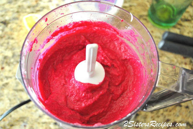 A food processor with the puree of all the ingredients. by 2sistersrecipes.com 