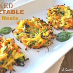 A white platter with 3 vegetable nests.