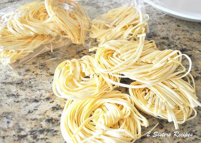 Photos of tagliatelle pasta on the counter. by 2sistersrecipes.com 