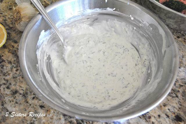 Tzatziki sauce in a bowl by 2sistersrecipes.com 