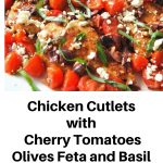 A white platter with cookied chicken cutlets topped with cherry tomatoes, olives, feta and basil.