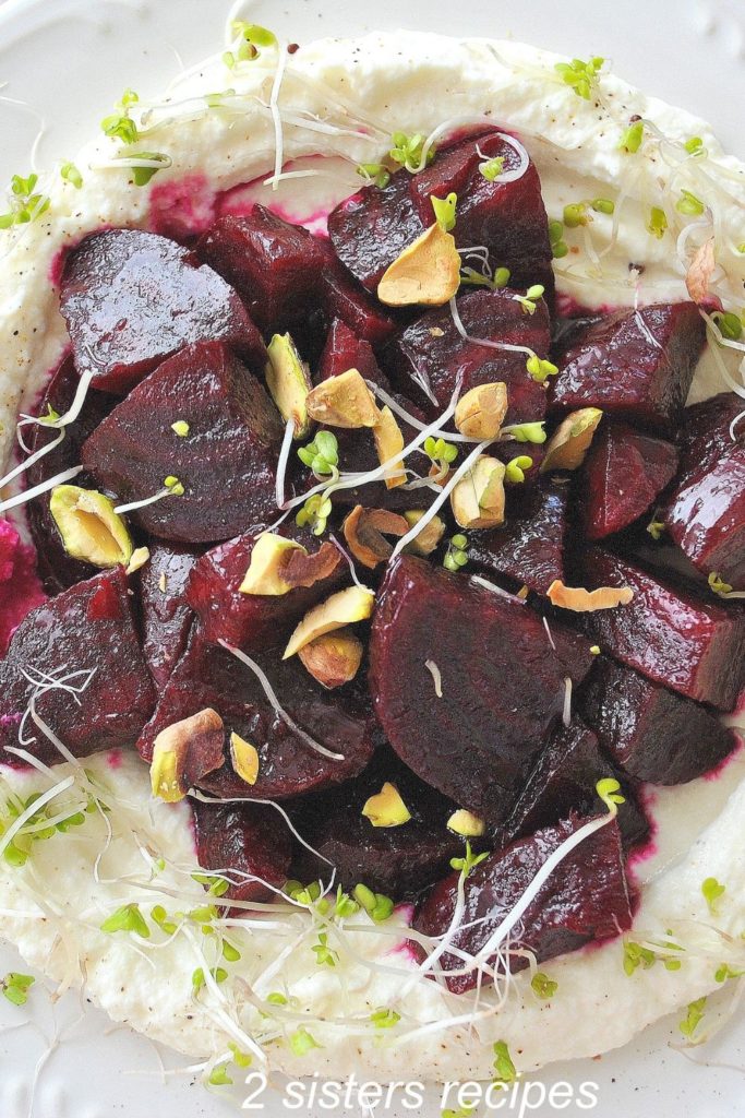 Beet Salad with Pomegranate Vinaigrette over Creamy Ricotta by 2sistersrecipes.com 