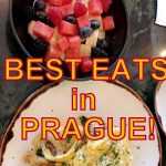 A bowl filled with fresh chopped fruit and a plate with an egg omelet.