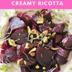 Beet Salad with Pomegranate Vinaigrette over Creamy Ricotta and topped with chopped pistachios.