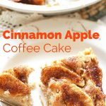 A pie dish filled with a coffee cake topped with apples and cinnamon and a fork.