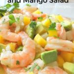 A shrimp salad loaded with chopped mango, avocado and cilantro.