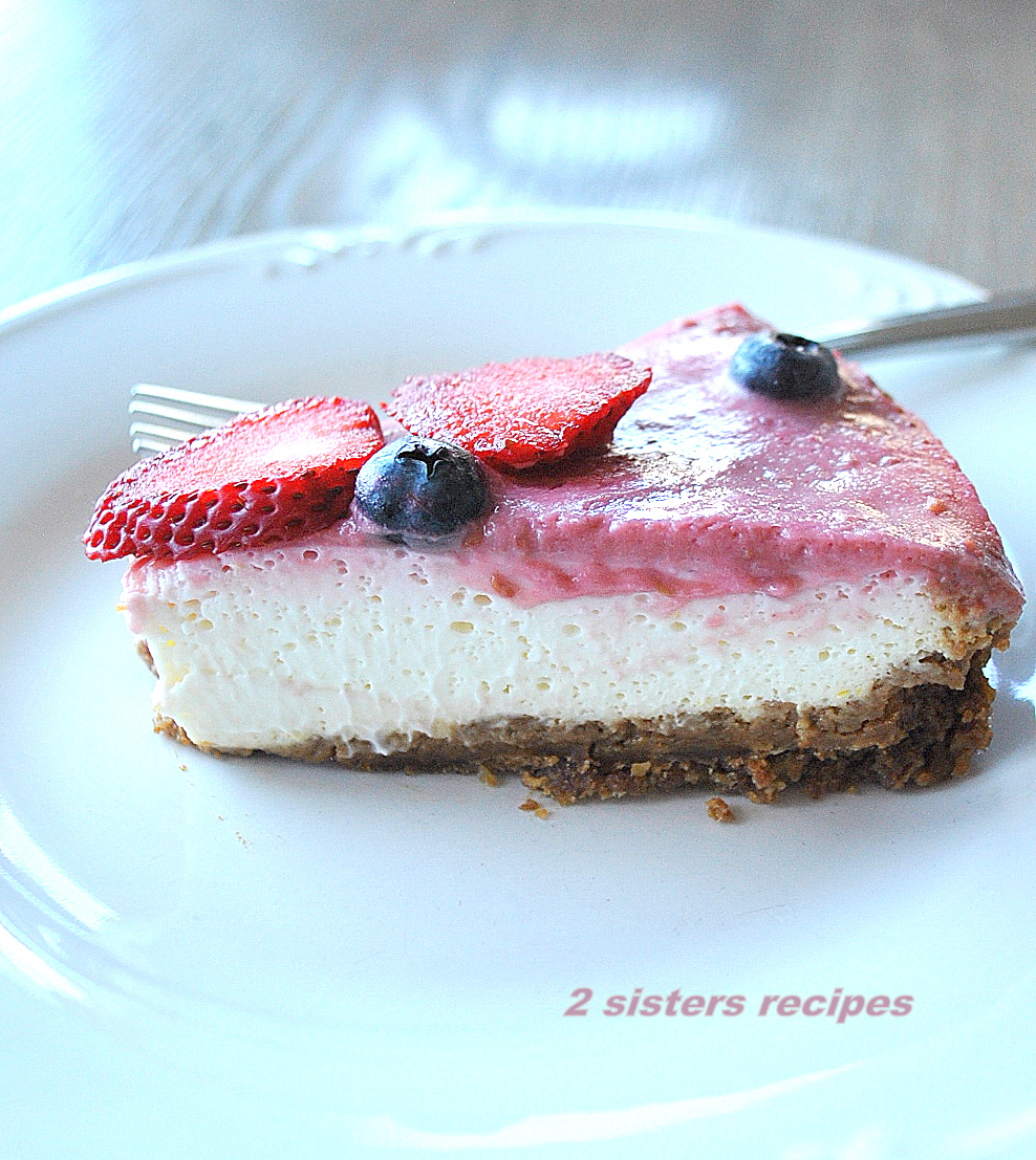 Lemon Raspberry Panna Cotta Cheesecake by 2sistersrecipes.com