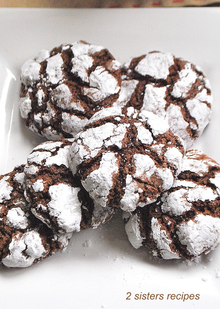 5 Chocolate Crinkle Cookies are served on a white plate.