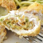 A forkful of filet of flounder rollatini.