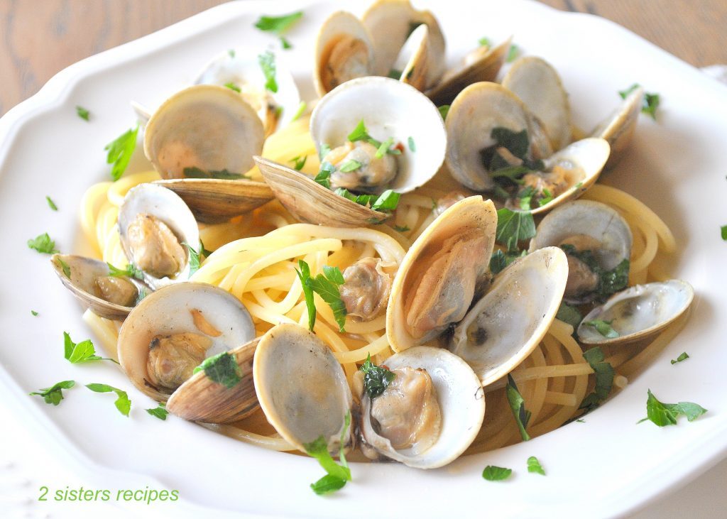 Little Neck Clams in Wine and Garlic Broth by 2sistersrecipes.com 
