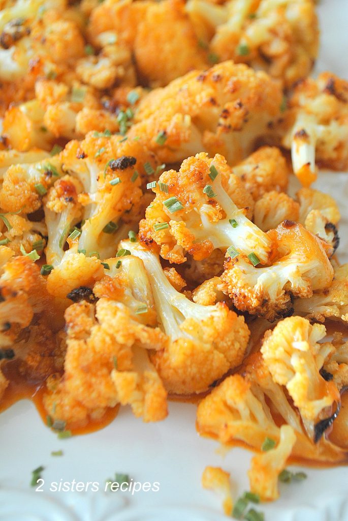 Baked Cauliflower Wings with Buffalo Sauce by 2sistersrecipes.com