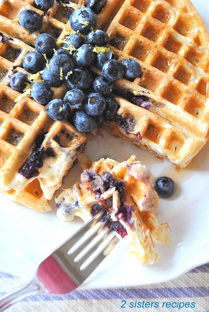 Light & Fluffy Lemon Blueberry Waffles by 2sistersrecipes.com