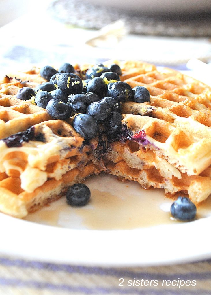 Light & Fluffy Lemon Blueberry Waffles by 2sistersrecipes.com