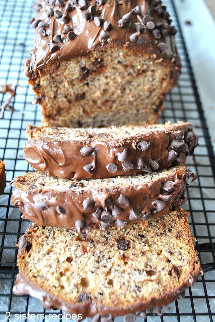 SLiced  Chocolate Chip  Banana Bread is one of our most popular by 2sistersrecipes.com