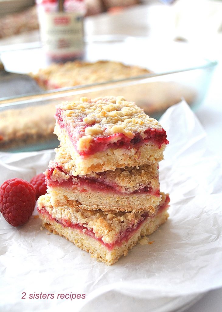 Raspberry Lemon Crumble Bars by 2sistersrecipes.com