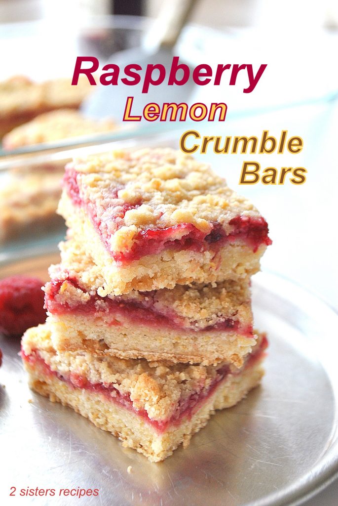 Raspberry Lemon Crumble Bars served on a silver plate.