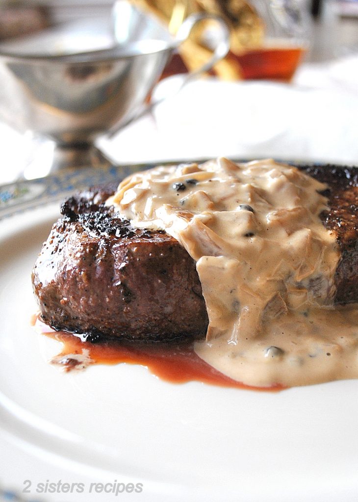 Filet Mignon with Cognac Peppercorn Sauce by 2sistersrecipes.com 